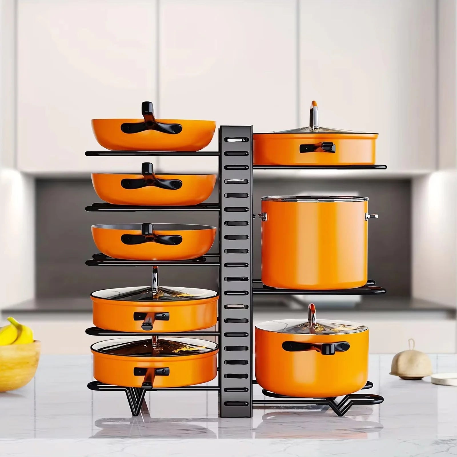 Heavy duty black pot and pan organizer rack fully loaded inside a kitchen cabinet", "Close-up of the adjustable tiers and non-slip lid holder on the metal storage rack